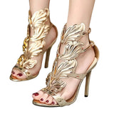 Sandales À Talons Hauts Dorées Avec Détails Ailes Sculptées