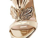 Sandales À Talons Hauts Dorées Avec Détails Ailes Sculptées