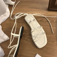 Sandale Plate Femme À Lanières Fines Et Style Minimaliste