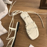 Sandale Plate Femme À Lanières Fines Et Style Minimaliste