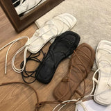 Sandale Plate Femme À Lanières Fines Et Style Minimaliste