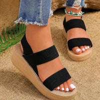 Sandales compensées femme noires à trois brides sur semelle espadrille