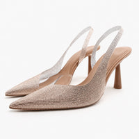 Sandale Femme Mariage Style Escarpin Chic beige avec finition scintillante, bout pointu, bride arrière ouverte, talon aiguille élégant et design raffiné pour les mariages, cérémonies et soirées.