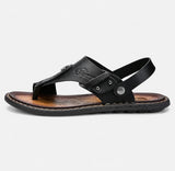 Sandale Homme Confortable Style Tong avec Lanière avec lanière arrière ajustable, bride en cuir, entre-doigt ergonomique, semelle confortable et design décontracté pour un usage quotidien.