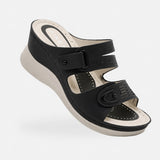 Sandale Orthopédique Femme Confortable Style Rétro noire avec brides réglables, semelle compensée ergonomique, soutien de la voûte plantaire et design confortable pour un usage quotidien.