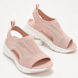 Sandale Orthopédique Femme avec Semelle Compensée rose poudré, en maille respirante, bout ouvert, semelle épaisse ergonomique et design confortable.