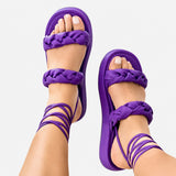 Sandale Spartiate Femme avec Fermeture à Lacets Violets, brides tressées violettes, lacets à nouer autour de la cheville, semelle plateforme épaisse et design tendance
