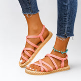 Sandale Spartiate Femme avec Lanières Croisées Rose, brides croisées, semelle plate effet corde tressée et design estival confortable