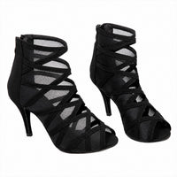 Sandale Talon Femme 10–13 cm Sexy avec Lanières Croisées noires avec brides multiples en maille ajourée, bout ouvert, maintien montant à la cheville et talon fin pour un style élégant et féminin.