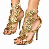 Sandales À Talons Hauts Dorées Avec Détails Ailes Sculptées