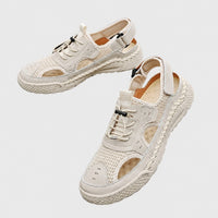 Sandales Confort Homme Avec Semelle Robuste beige avec conception respirante, fermeture ajustable, ouvertures latérales et semelle épaisse antidérapante pour la marche et le confort quotidien.