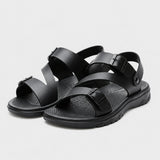 Sandales En Cuir Confortables Avec Semelle Souple Antidérapante noires avec brides réglables à boucles, maintien arrière, semelle souple antidérapante et design confortable pour la marche et le quotidien.