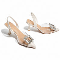 Sandales à Talons Transparentes avec Cristal avec brides transparentes, ornements en cristal scintillant, bout pointu, bride arrière et talons fins pour un style chic et raffiné.